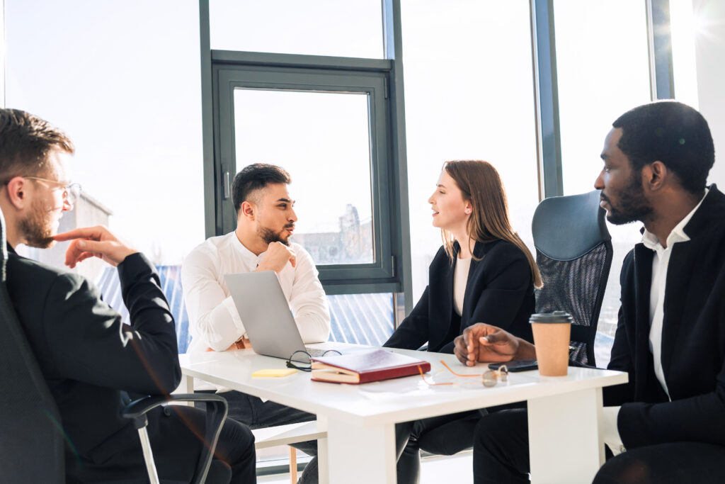Leaders discussing opportunities for growth in the company.